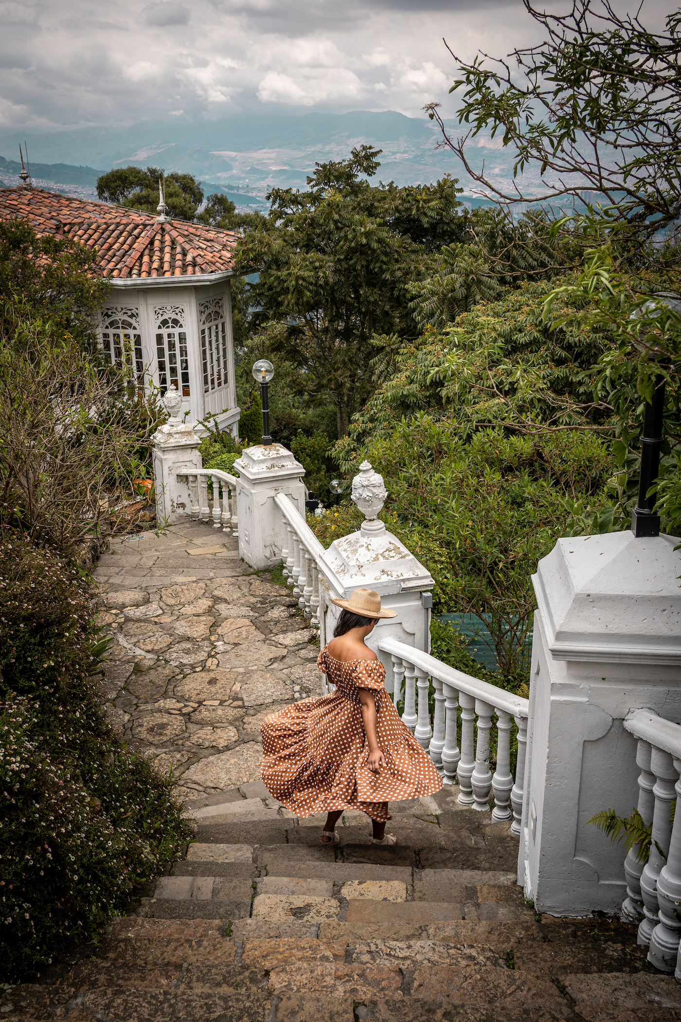 Cerro Monserrate Hill in Bogota Colombia Caroline Constas Dress Lack of Color Hat Bzees wedge sandals