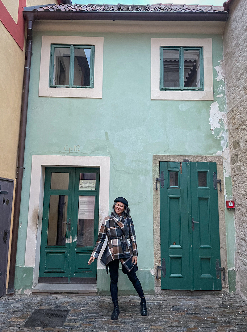 Green medieval house on Golden Lane Prague