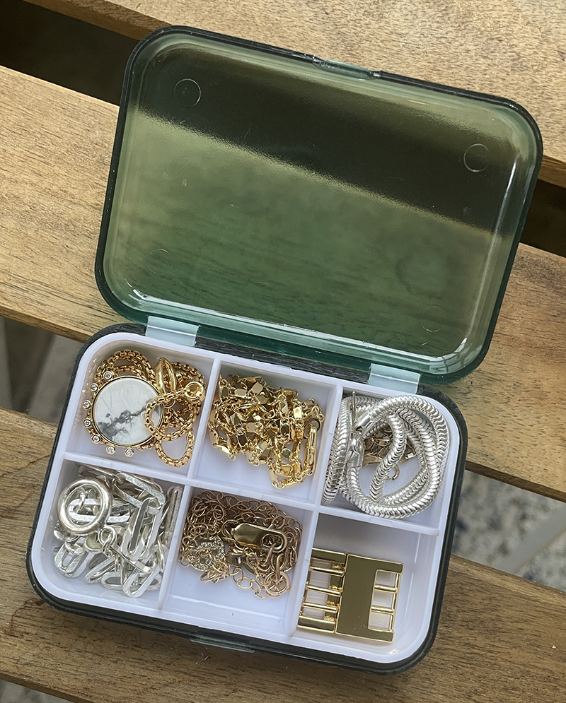 pillbox used as travel jewelry storage box