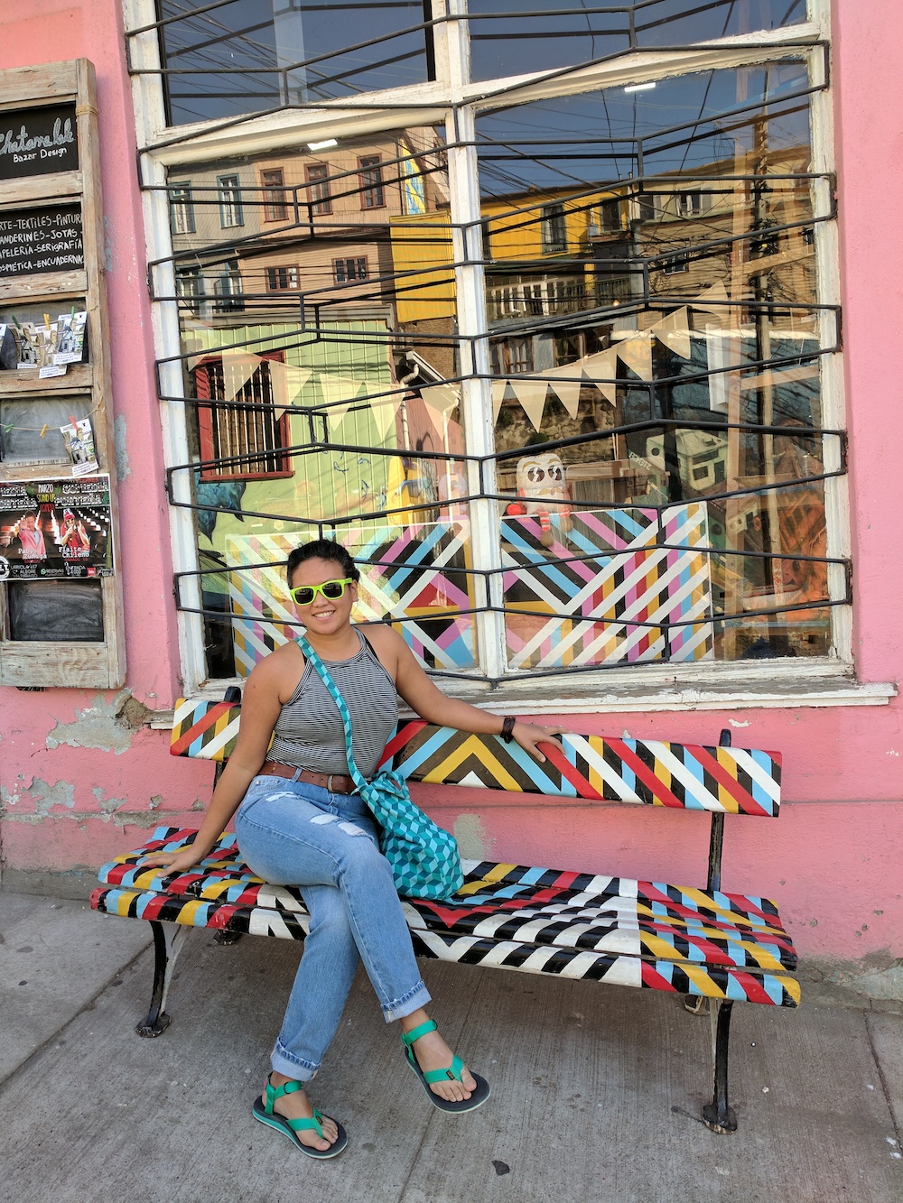 Colorful pink wall and bench in Valparaiso Chile