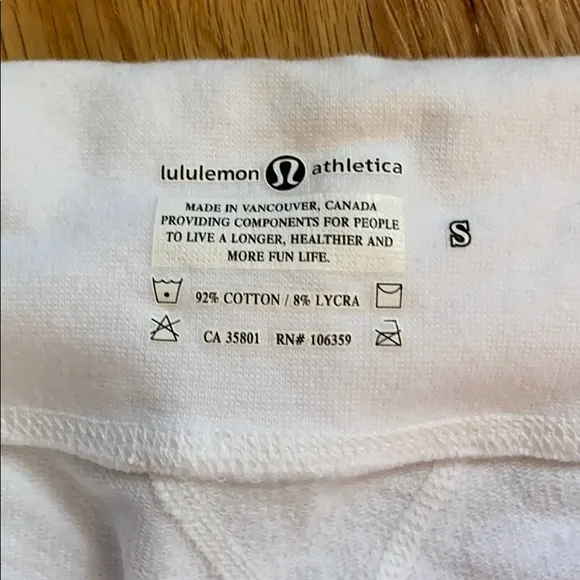 The tag on my oldest piece of lululemon: “providing components for people  to live a longer, healthier and more fun life” : r/lululemon