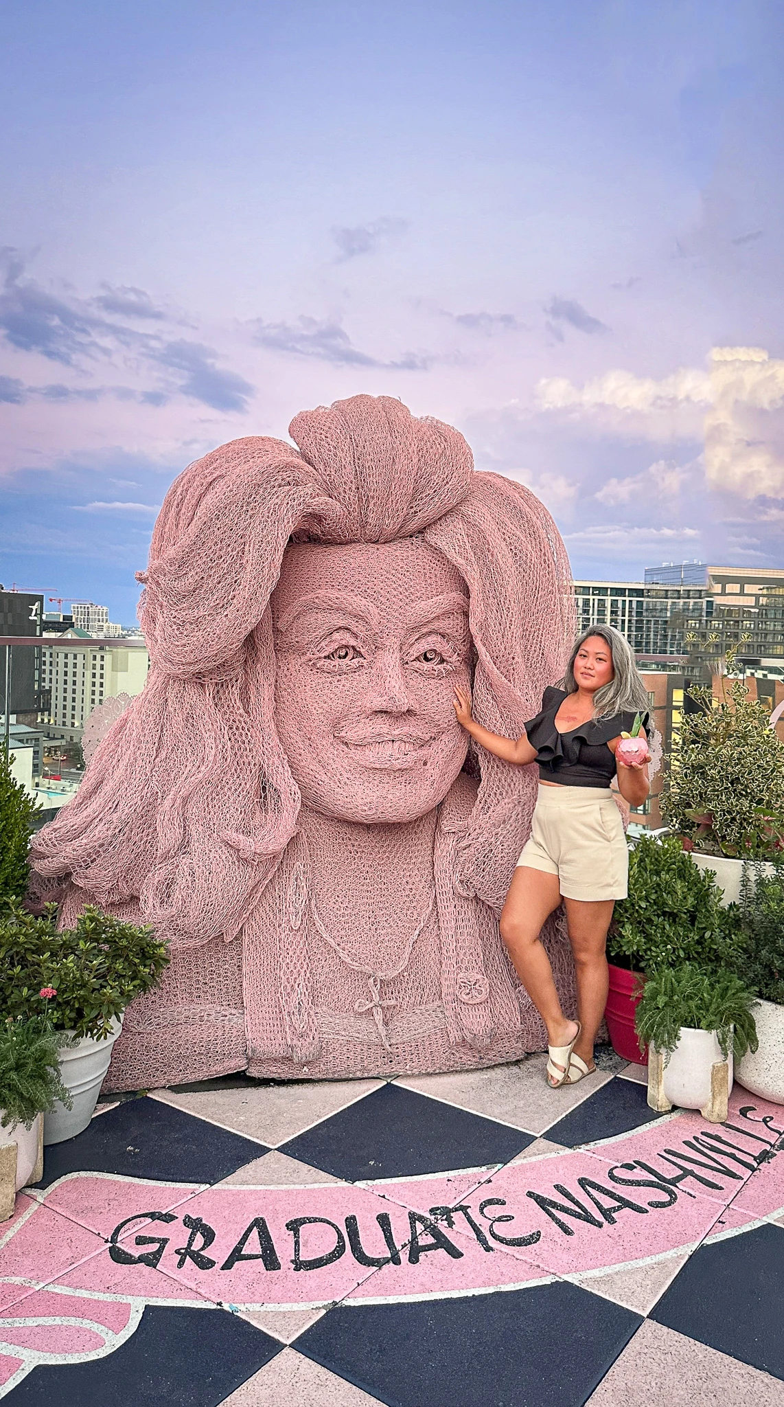 pink dolly parton head at White Limozeen rooftop bar graduate hotel nashville